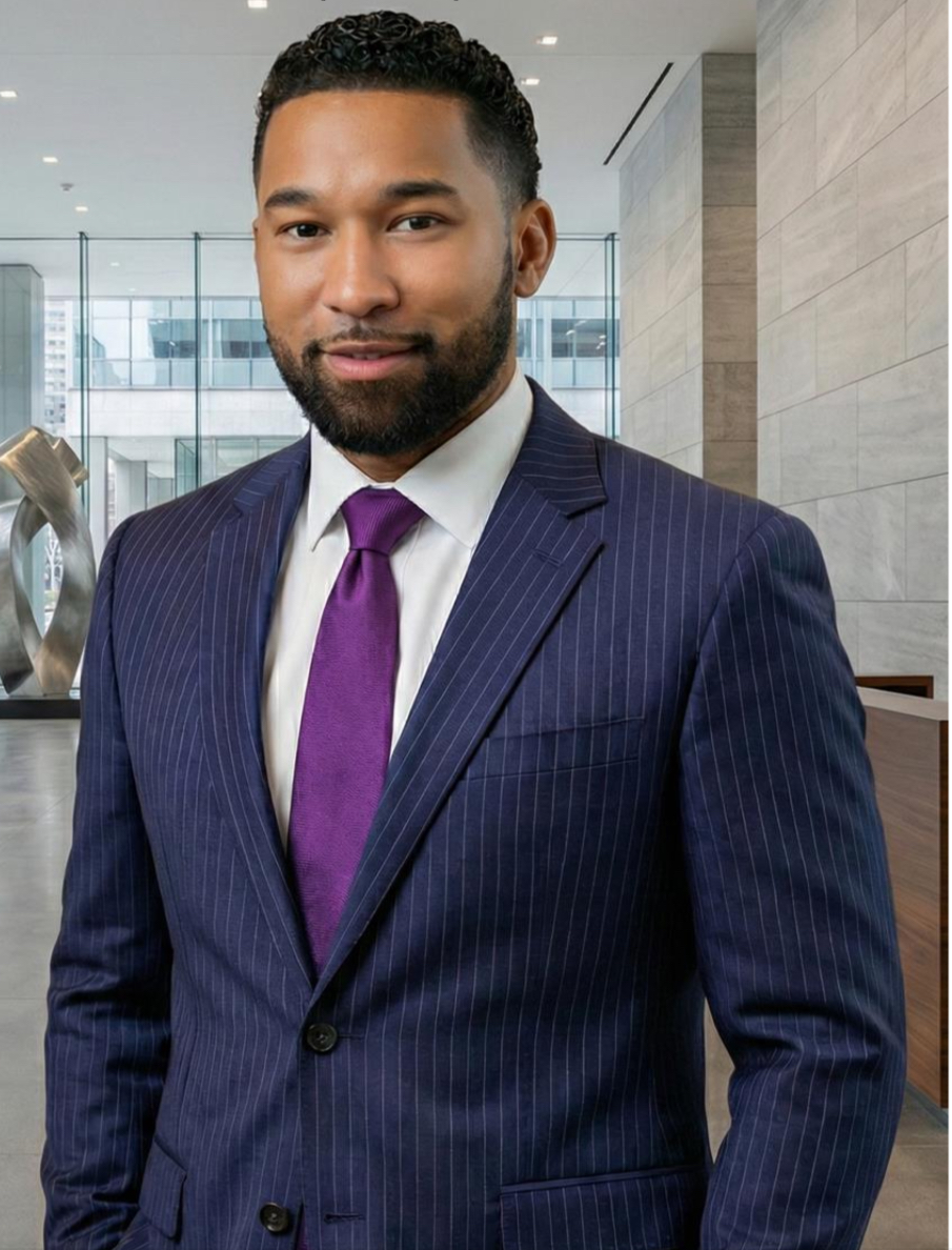 Dr. Martinez wearing a navy pinstripe suit and purple tie in an architectural interior