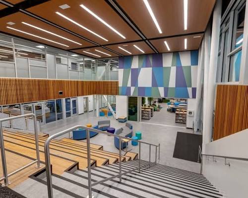 Tiered seating and an open two-story learning commons at Sonia Sotomayor Elementary School